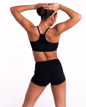 Girl in ribbed shorts and dance attire - full body rehearsal look